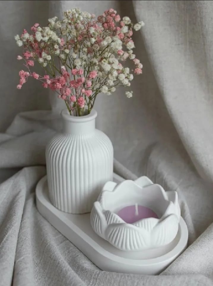Minimalist white home decor set with ribbed mini vase, tulip pot and oval tray styled with flowers